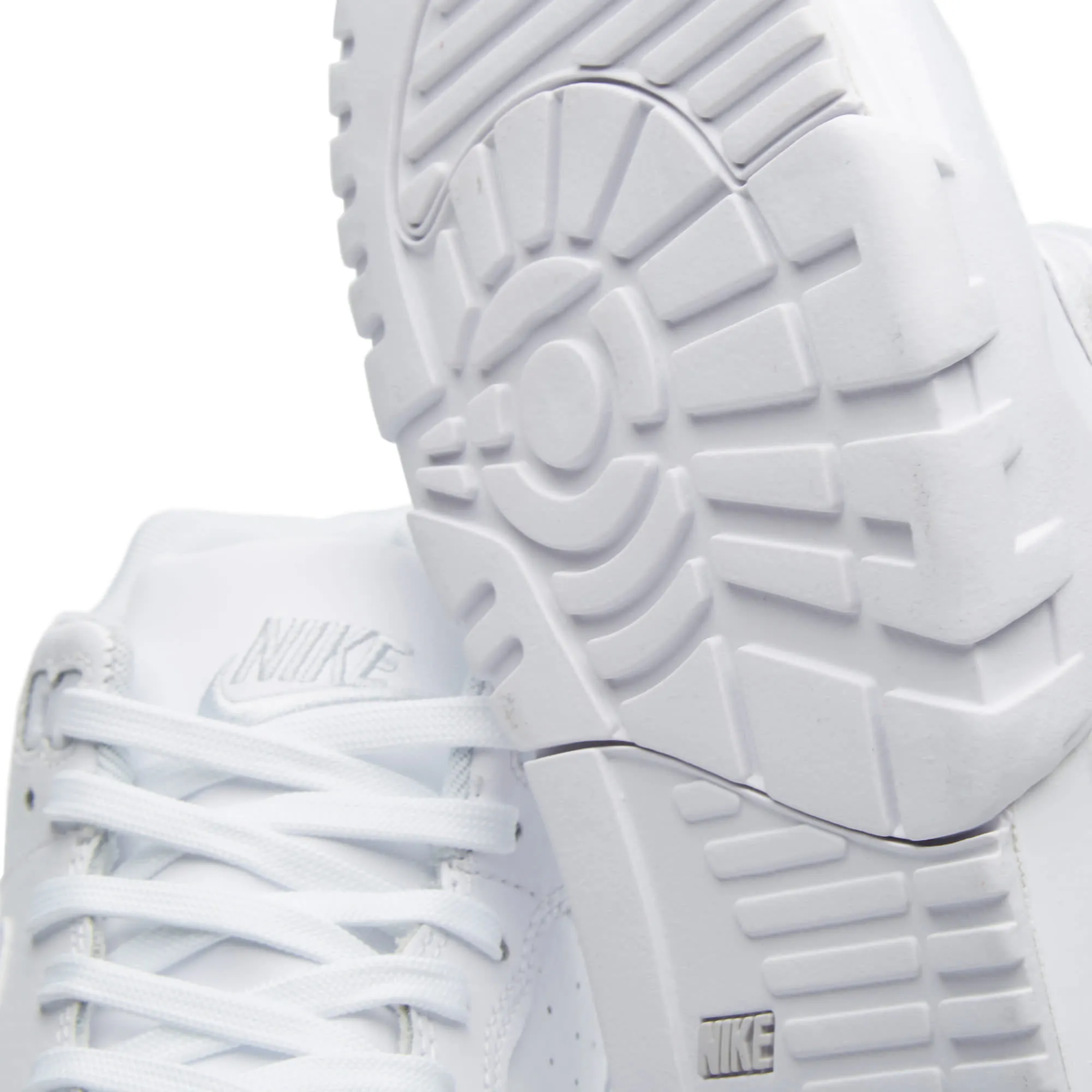 Mid-Top Nike Air Trainer 1 in White and Pure Platinum