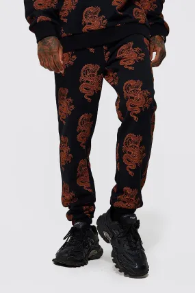 Regular Fit Dragon Print Joggers | boohooMAN UK