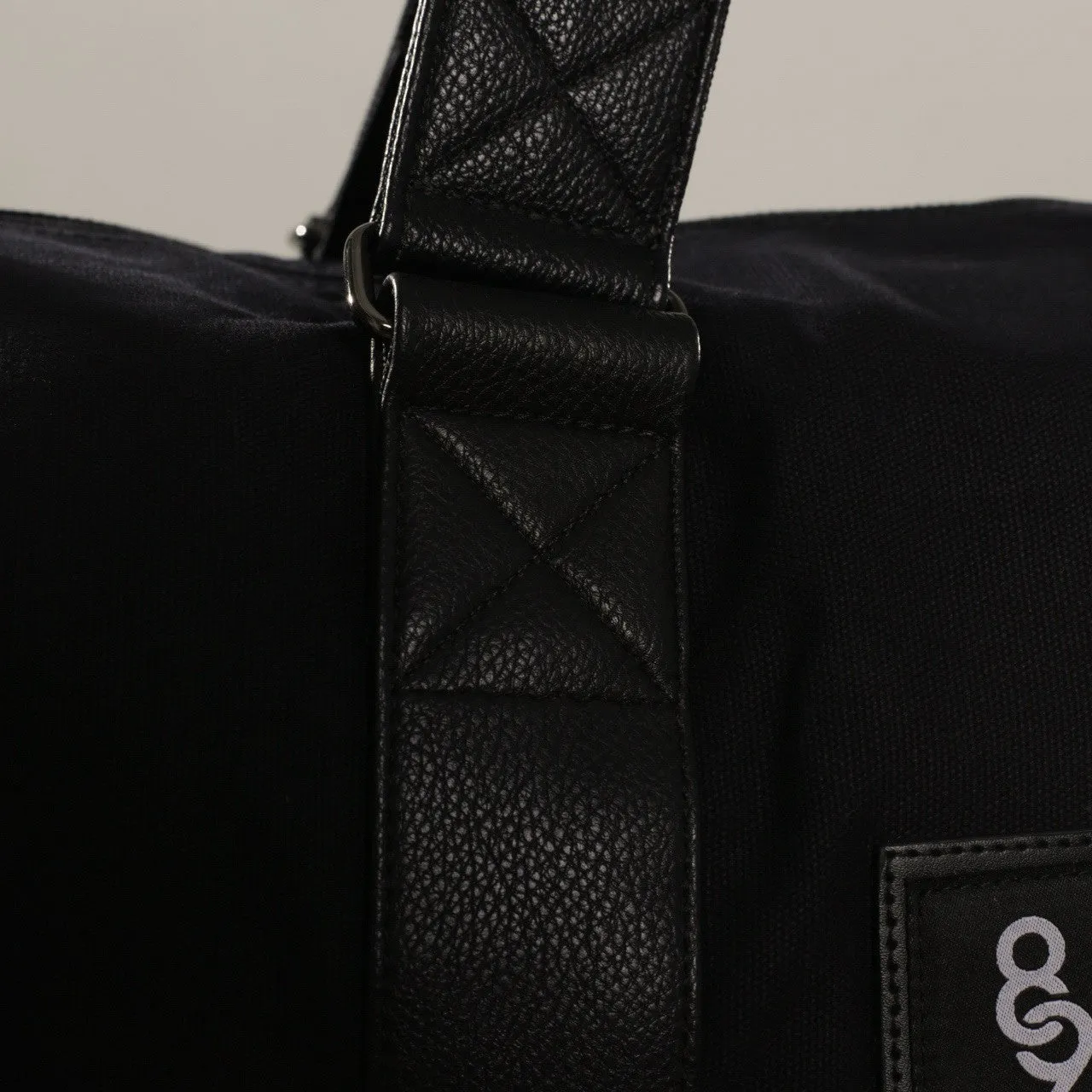 Triple Black Canvas Duffel Bag